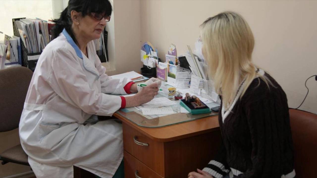 врачи